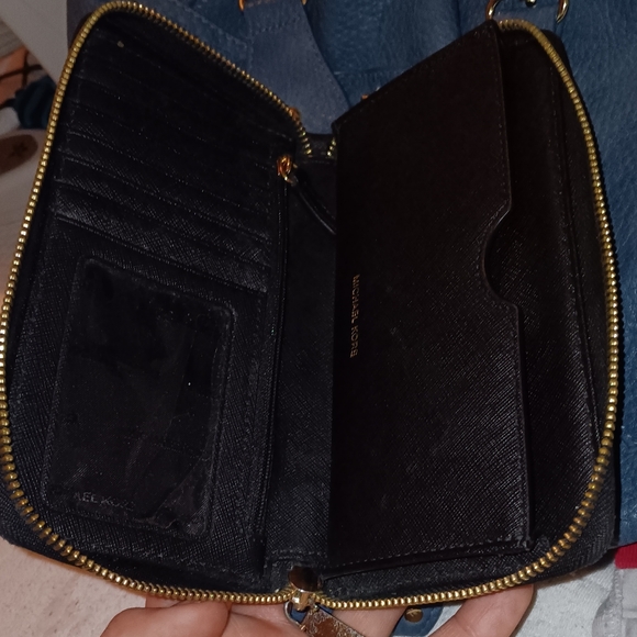 Michael Kors black zip around wallet with ID slot, phone,card, and coin slots - Picture 9 of 9
